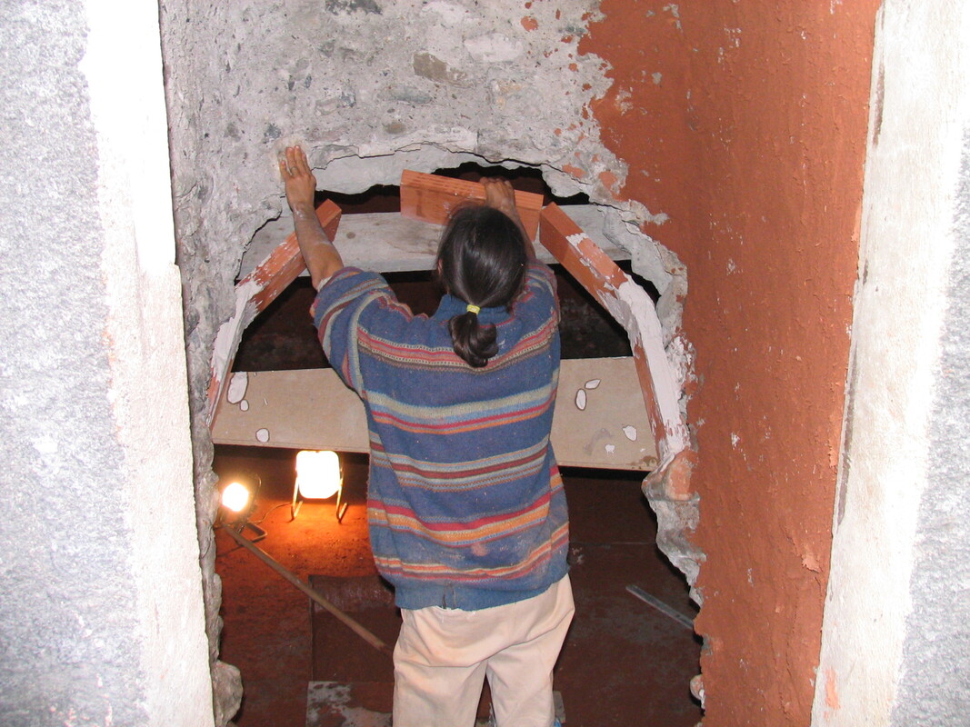 Création d'une ouverture dans une voute en pière et création de l'arc de déchage sous forme de voute sarrazine.