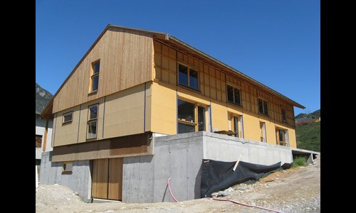 Maison mitoyene ossature bois isolation paille.